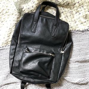 Black faux-leather backpack
